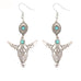 Silver Longhorn skull earrings with turquoise beads