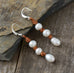 These earrings are 8mm freshwater pearls on leather. 