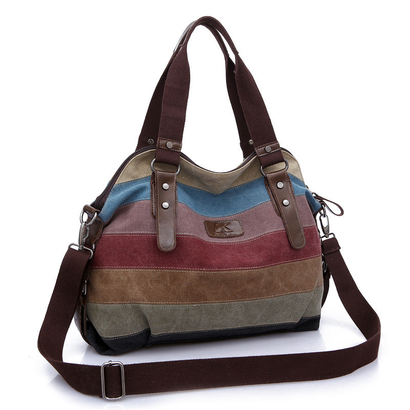 Large tote/messenger bag.  Holds everything you need.